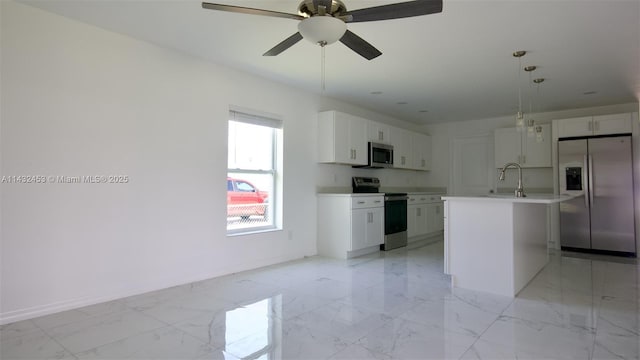 3433 Jeffcott St, Fort Myers, FL 33916 - kitchen featuring white cabinets, light countertops, marble finish floor, ceiling fan, and appliances with stainless steel finishes