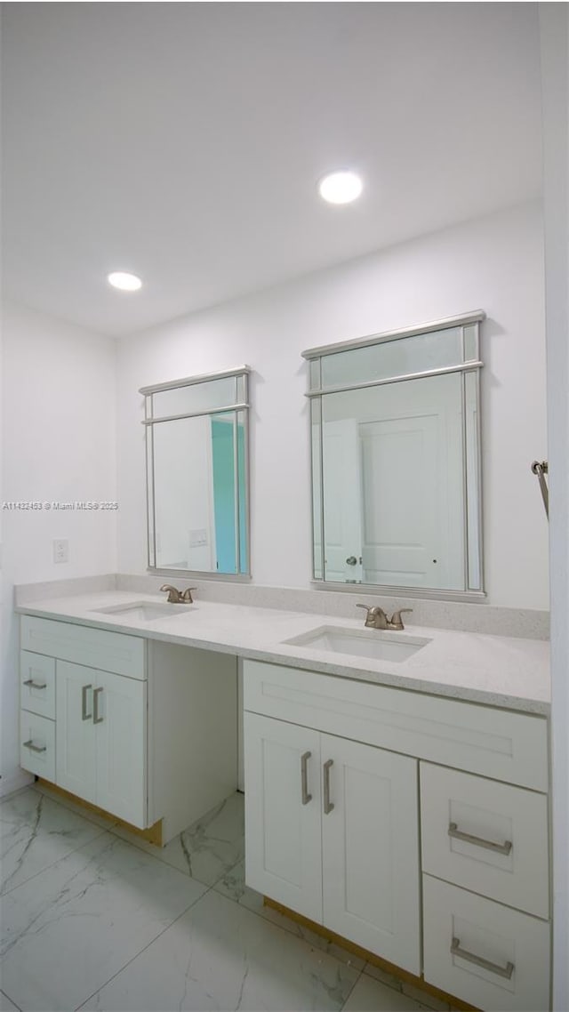 3433 Jeffcott St, Fort Myers, FL 33916 - full bath with marble finish floor, a sink, double vanity, and recessed lighting