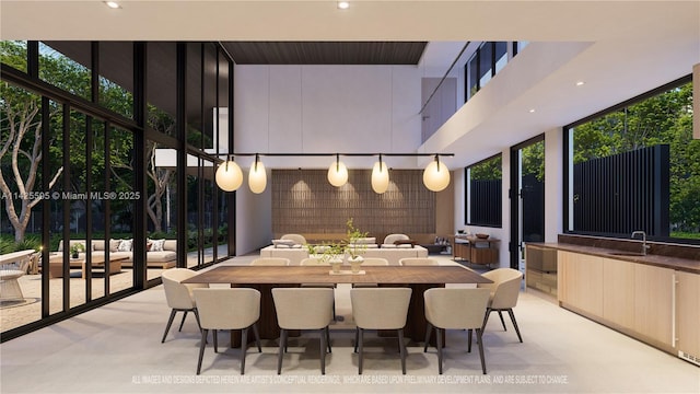 dining room featuring a high ceiling