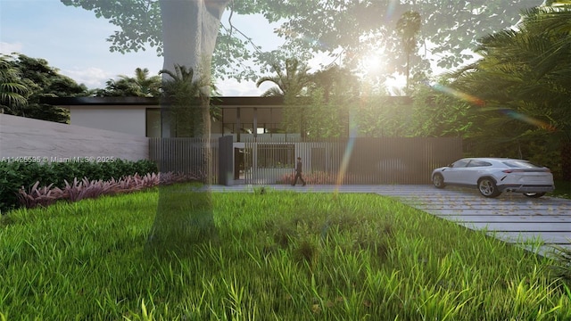 view of front of property featuring a gate and fence