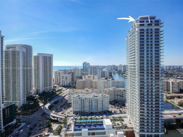 property's view of city with a water view