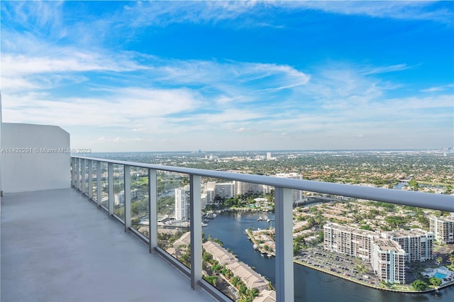 balcony featuring a water view