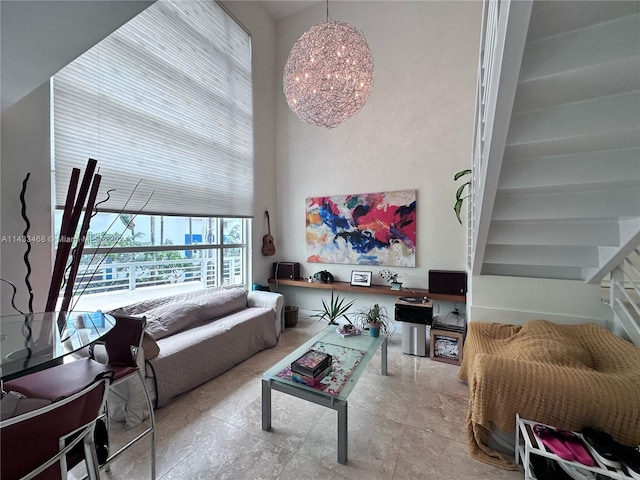 living room with a notable chandelier