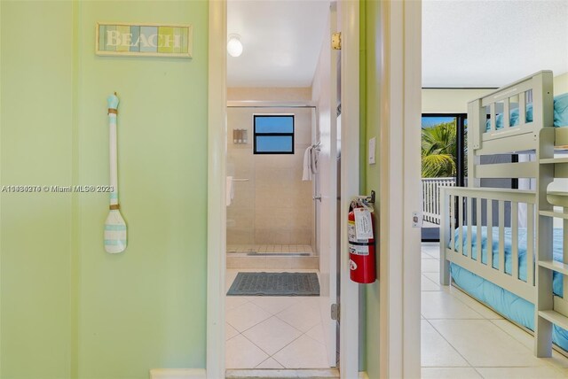 corridor with light tile floors