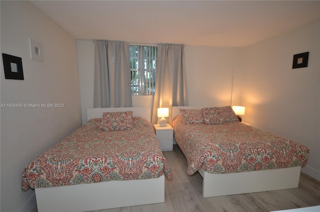 bedroom featuring hardwood / wood-style floors