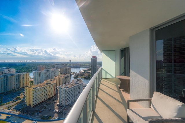 balcony featuring a water view