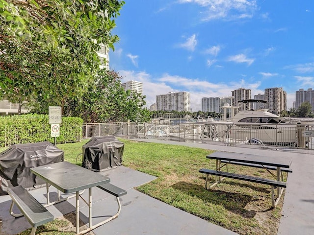 exterior space with a lawn and a patio