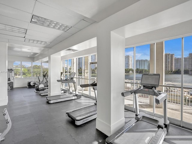 workout area featuring a paneled ceiling