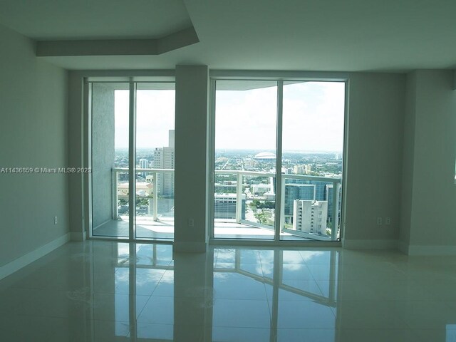 empty room featuring tile flooring