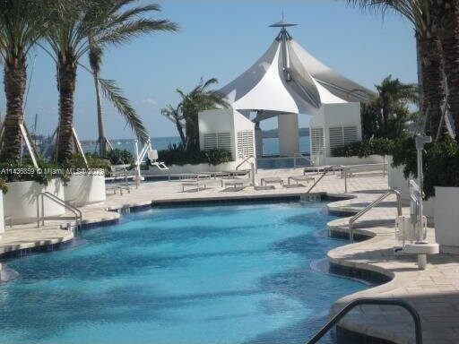 view of swimming pool featuring a patio area