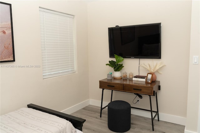 bedroom with light wood-type flooring