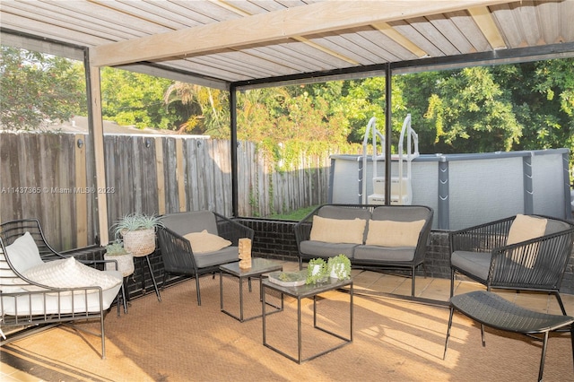 view of patio / terrace with outdoor lounge area and a pergola