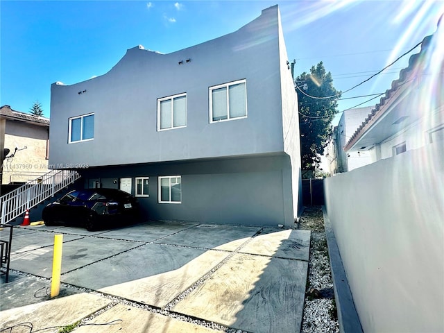 back of property featuring a patio area