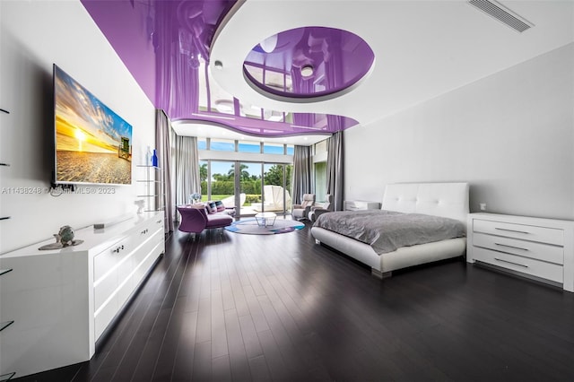 bedroom featuring dark wood-type flooring