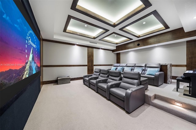 carpeted home theater featuring coffered ceiling