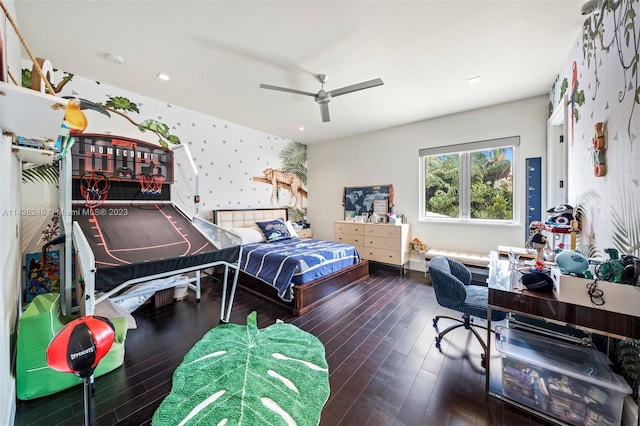 bedroom featuring dark hardwood / wood-style floors and ceiling fan