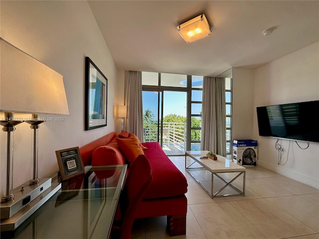 tiled living room featuring expansive windows