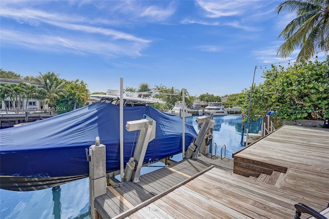 view of dock with a water view