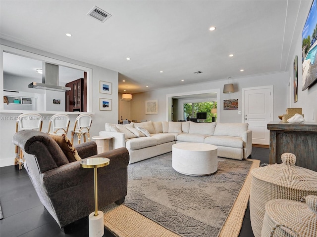 tiled living room with ornamental molding