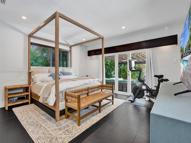 tiled bedroom featuring access to exterior