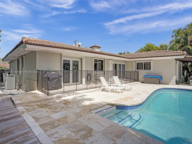 rear view of property with a patio