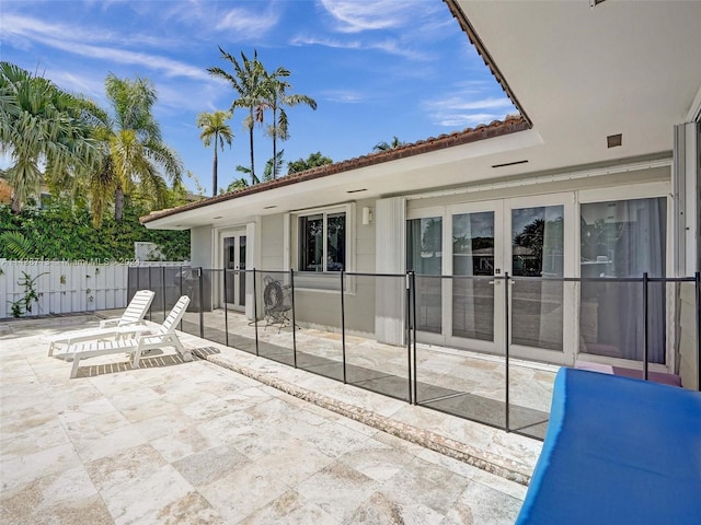 view of patio featuring french doors