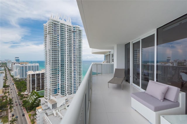 balcony featuring a water view