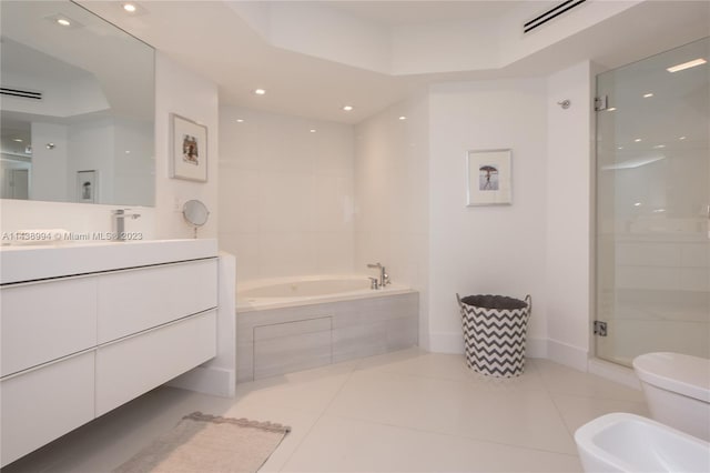 bathroom with a bidet, vanity, shower with separate bathtub, and tile floors