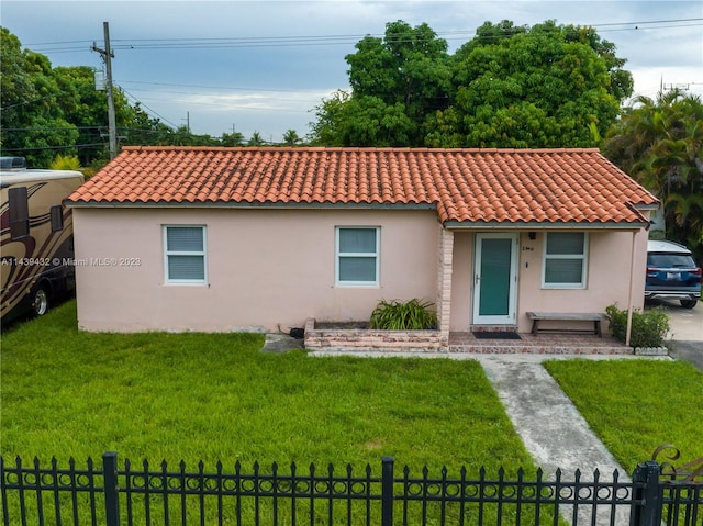 view of front of house with a front yard