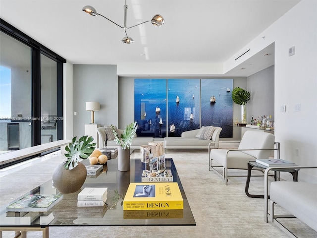 living area with floor to ceiling windows