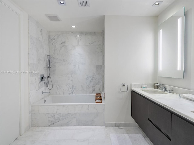 bathroom featuring marble finish floor, visible vents, a sink, and double vanity