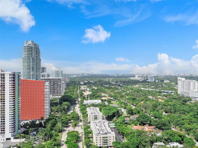 drone / aerial view featuring a city view