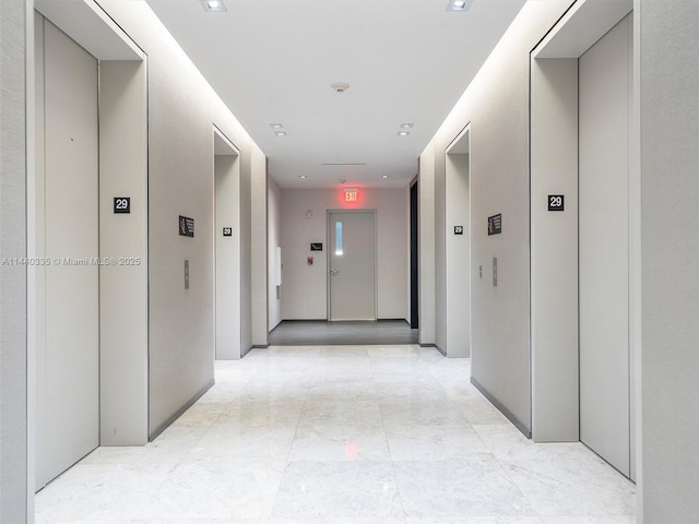 corridor featuring elevator