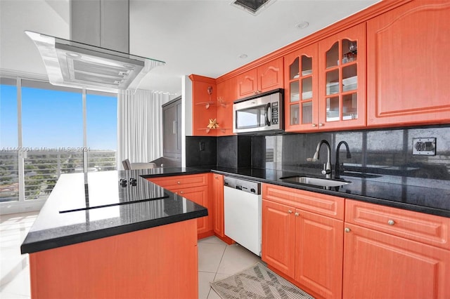 kitchen featuring tasteful backsplash, light tile floors, black electric cooktop, dishwasher, and sink