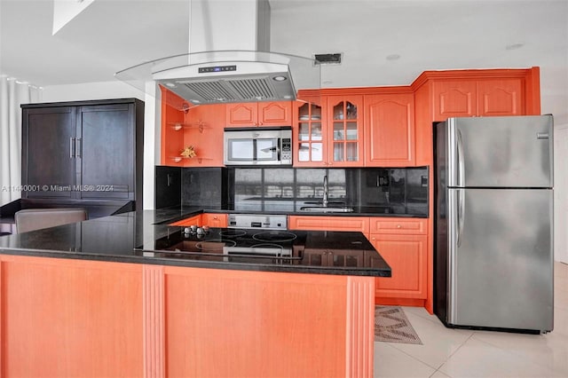 kitchen featuring backsplash, sink, stainless steel appliances, light tile floors, and island exhaust hood