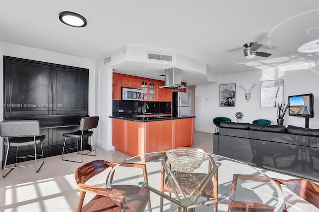 interior space featuring refrigerator, ceiling fan, light tile flooring, and extractor fan