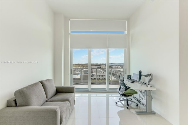 sitting room with light tile flooring