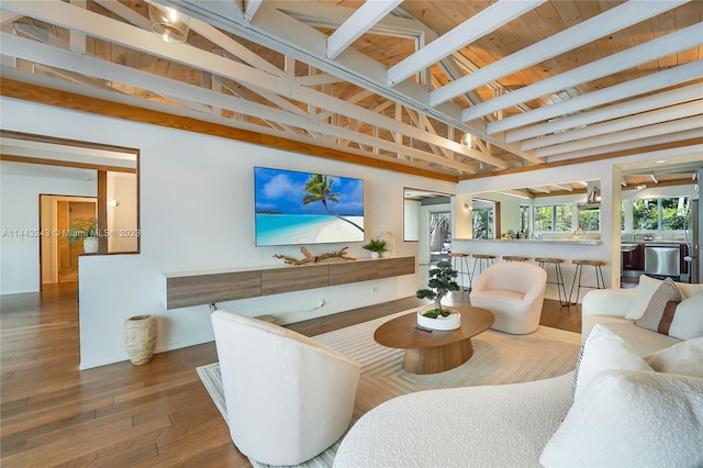 living room featuring wooden ceiling, beam ceiling, and dark hardwood / wood-style floors