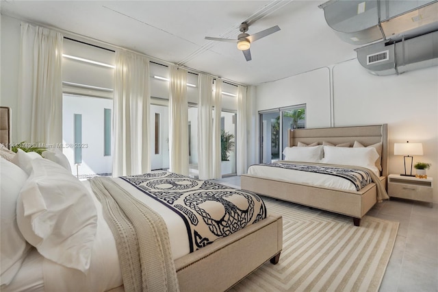 bedroom with ceiling fan, access to exterior, and light tile patterned flooring