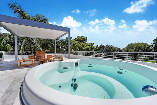 view of pool featuring a hot tub