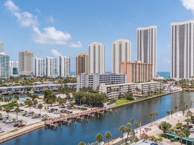 property's view of city featuring a water view