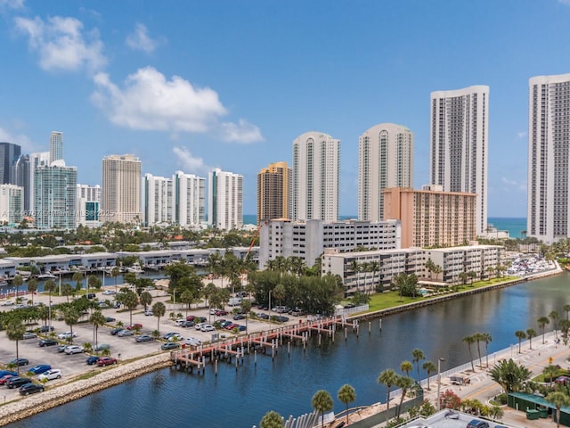 property's view of city featuring a water view