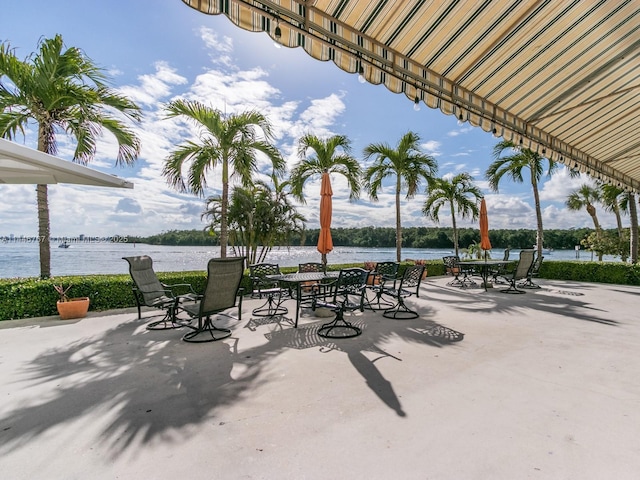 view of patio / terrace with a water view