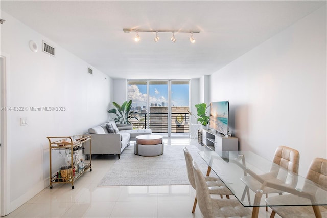 tiled living room with track lighting