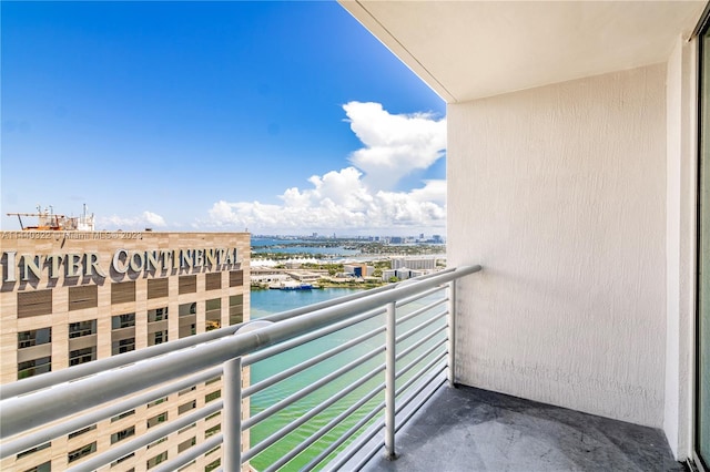 balcony featuring a water view