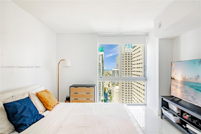 bedroom with light tile flooring