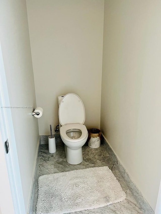 bathroom featuring toilet