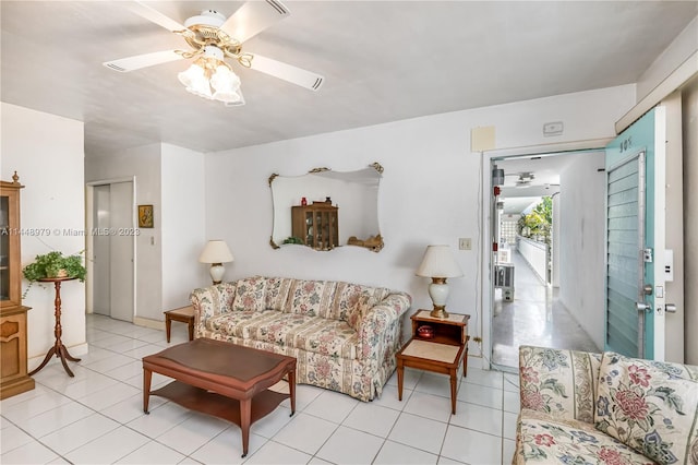 living room with ceiling fan and light tile flooring