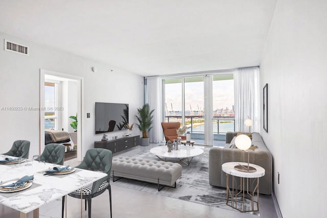 living room featuring concrete floors