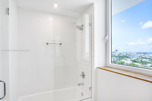 bathroom featuring enclosed tub / shower combo